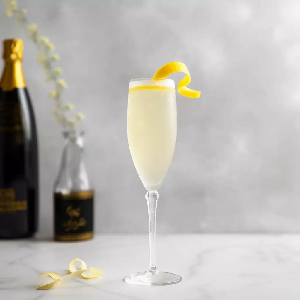 French 75 cocktail in a Champagne flute with a lemon twist garnish